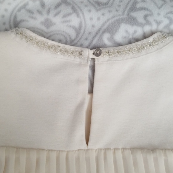 Jennifer Lopez cream sleeveless top - Picture 3 of 5